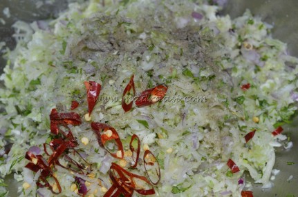 Grated cabbage, onions, red chilies, black pepper powder, coriander leaves and salt
