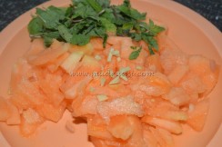 Chopped muskmelon and mint leaves