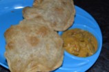 Sour and Spicy Mushroom Gravy served with poori