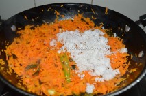 With grated coconut
