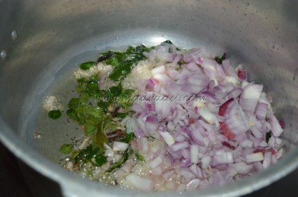 Onions and spices getting cooked with gingelly/sesame oil