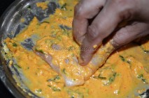 Fish getting coated in the batter