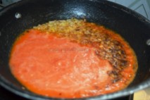 With tomato sauce