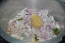 With finely chopped onions and curry leaves